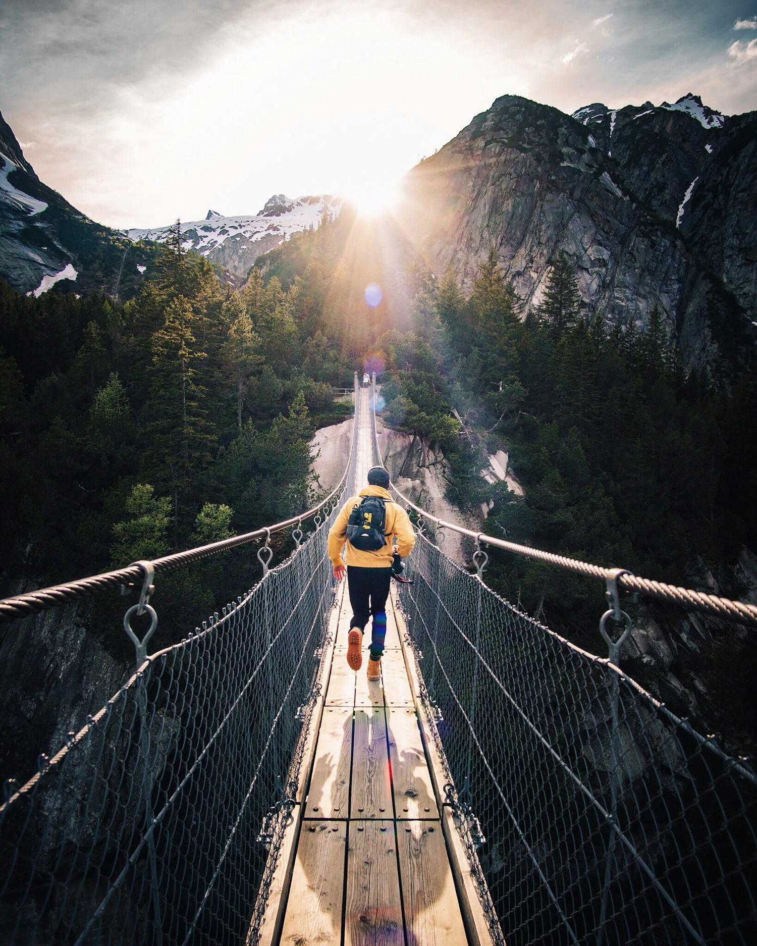  Man stands poised on the brink of adventure